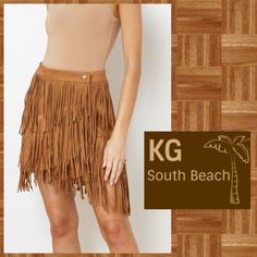 Details: Luxury Boutique Brand Trendy Fringed Mini Skirt In Warm Tan Off-Center Snap Closure With Inside Button For A More Secure Fit And Tailored Look Layered And Tiered For An Asymmetrical Look Unique, Original & Very On Trend Tribal Or Western Style Look High Rise - Made To Wear Right At Waistline A-Line Style. Fitted Waist W/Stretch In The Skirt 95% Polyester And 5% Spandex Measurements (Laid Flat, Approx): Waist: (S) 13” (M) 14” (L) 15” (With About 2” Of Stretch) Length: 18" Condition: New Bohemian Style Mini Bottoms For Party, Bohemian Mini Length Bottoms For Party, Brown Mini Skirt For Festival, Brown High Waist Mini Skirt For Summer, Chic Mini Skirt For Festival, Chic Festival Mini Skirt, Brown Short Skirt For Summer, Summer Brown Short Skirt, Summer Brown Short Length Skirt