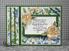 a handmade card with flowers and the words wishing you a little extra happiness