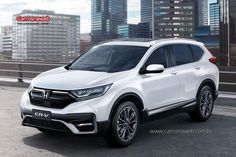 a white honda cr - v parked in front of some tall buildings