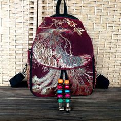 Type:Women Shoulder Bag Material: Canvas，Pu Popular element: Nationality ，embroidery One SizeThick: 10.00 cm/3.94"Width: 25 cm/9.83 "Height: 36.00 cm/14.17" Embroidered Shoulder Backpack For Daily Use, Embroidered Backpack For Daily Use, Daily Use Embroidered Fabric Bag, Bohemian Fabric Travel Bag, Bohemian Travel Bags In Fabric, Casual Embroidered Shoulder Bag As Gift, Casual Embroidered Shoulder Bag For Gift, Embroidered Shoulder Backpack, Embroidered Fabric Bags For Everyday Use