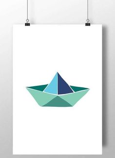 a blue paper boat floating on top of a white poster hanging from the side of a wall