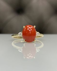 For more gorgeous jewelry, please visit : https://www.etsy.com/shop/MastikaJewelry Certificated Natural Coral w/ Diamond Dainty Classic Engagement Ring * 14K Solid Gold * Genuine Gemstone * Best Gift for Her ◎ Details ◎ ○ Gemstone Details .Certificated Natural Orangish Red Coral Oval Cut 9.90x7.90 mm 2.49 ct .Genuine DIAMOND Round Cut 1.9 mm - 2 pcs G VS / SI total approx. 0.07 ct ○ Gold Details 14K Solid Gold Width of Band : 2.00 mm Weight of Ring : approx 3.00 gr Made to Order HANDMADE ITEM ○ Coral Gold Ring For Women, Moonga Stone Ring Designs, Red Coral Stone Ring, Round Stone Ring Designs, Coral Stone Ring Design For Women, Moonga Ring Design In Gold, Pagadam Rings, Coral Ring Designs For Women, Coral Rings For Women