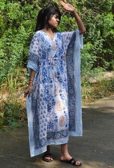 This Beautiful Hand Block Print Caftan or can be called as Tunic is made with super fine quality cotton and designs have been crafted by Hand Prints. Usage - Tunic, Gown, Maxi, Bikini Cover up, Beach Wear, Caftan, Bathrobe Caftan, Swim Wear, Party Caftan Fabric - 100% Cotton Color - White Pattern - Floral Print Size - Plus Size, can fit Upto 4XL Bust/chest size - Free Size ( Drawstring ) Long Caftan- 46" Inches (Approx.) * It has Adjustable Drawstring Waist. * V Shape Neck Which is 8" Inches Dee Blue Cotton Kaftan For Loungewear, Long Blue Cotton Kaftan, Blue Cotton Maxi Dress For Loungewear, White Long Cotton Sleepwear, Blue Cotton Long Sleeve Kaftan, Bohemian Cotton Sleep Dresses, Cotton Maxi Sleep Dress, Blue Bohemian Sleepwear For Home, Long Cotton Home Dress