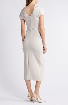 Whether you're off to the office or your next cocktail party, this stretch-enhanced sheath dress has you covered. Back zip closure Boat neck Short sleeves Unlined 90% polyester, 10% spandex Dry clean Made in the USA Beige Knee-length Bodycon Evening Dress, Beige Sheath Bodycon Dress For Evening, Beige Sheath Bodycon Evening Dress, Beige Midi Bodycon Dress For Evening, Beige Bodycon Midi Dress For Evening, Beige Sheath Bodycon Dress For Formal Occasions, Beige Knee-length Bodycon Dress For Formal Events, Beige Knee-length Bodycon Dress For Formal Occasions, Elegant Beige Bodycon Dress For Work