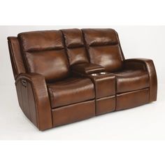 a brown leather reclining sofa with two seats on it's back and one arm facing