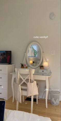 there is a vanity with a mirror on it