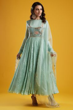 Editor's Note This set features an aqua anarkali with organza dupatta and churidar. Color: Aqua Fabric: Crepe Silk Care: Dry Clean Only About the Designer Aayushi Maniar label was founded in the year 2016. The brand defines luxury with comfort and modern design philosophy. Her styles comprise fashion-forward statement pieces like Cape tops, Pre draped sarees, Lehengas and Anarkalis. The aim is to keep traditional aspects with a fresh and renewed perspective that is perfect for a modern woman, a Draped Sarees, Blue Anarkali, Silk Fashion, Cape Tops, Embroidered Anarkali, Anarkali Dress Pattern, Aqua Fabric, Indian Dresses Traditional, Color Aqua