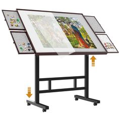 a drawing table with three different pictures on it