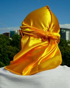 Order your "24K Yellow" Stretchy Silk JagRag today to experience comfort and functionality in a designer durag. The "24K Yellow" Stretchy Silk JagRag is: Comfortable Stretchable (4-way) Non-damaging Protective Breathable Are you looking for a new durag that looks good, feels good, and works? If so, look no further than the "24K Yellow" Stretchy Silk JagRag. This innovative durag combines the functionality of a normal durag with the comfort and style that standard durags can’t provide. Order your Fashion Dream Job, Gold Velvet, Black Excellence, Turbans, Mellow Yellow, Black Culture, Fitted Hats, Black And Gold, Hijab Fashion