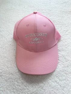 This Sunkissedcoconut Trucker Hat is perfect for everyday wear. The light pink thread against the white hat creates a beautiful contrast that enhances your skin's natural radiance. Boost your look with this stylish and versatile hat. FINAL SALE due to hygiene purposes. Achieve that perfect fit with the snap closure and adjustable feature of this trucker hat (snap into style!). Stay cool and breezy with the vented back for ultimate comfort! Colors may vary from different viewing devices. Cute Trucker Hat, Pink Thread, Sleep Accessories, White Hat, Logo Collection, New Iphone, Comfort Colors, Snap Closure, The White