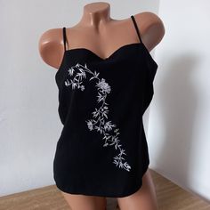 2000s Сrop tops for women     Vintage blouses Y2K  Top with straps with Embroidery Floral  Women blouse Retro Clothing Clothes Party  festival Boho Flowers M Polyester 100%    Color  Black white       Measurement: Bust 37 inches / 94cm Waist 33 inches / 84cm Length 21 inches / 53cm Summer Party Cotton Camisole, Casual Party Camisole Top, Casual Camisole Top For Party, Summer Party Tops With Floral Embroidery, Embroidered Sleeveless Fitted Top, Summer Camisole With Floral Embroidery And Spaghetti Straps, Embroidered Fitted Sleeveless Top, Fitted Embroidered Sleeveless Top, Y2k Spaghetti Strap Tops For The Beach