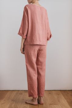 "When ordering you can choose to have the \"PANTS\" or \"TOP\" only or the whole \"PAJAMA SET\" of both items. When buying a set you save 5 euro. Comfortable relaxed fit EVA pajama pants in soft salmon with pockets and fabric strap. Oversized CHLOE top in soft salmon. TOP: - length is ± 64 cm (25\") (depends on size) - wide mid-length sleeves - boxy fit BOTTOM: - outseam is ± 98 cm (38.5\") (depends on size) - inseam is ± 70 cm (27.5\") - elastic waistband with fabric strap - two side pockets DE Linen Sets For Spring Pajama Party, Linen Sets For Pajama Party In Spring, Linen Sets For A Spring Pajama Party, Spring Linen Sleepwear For Home, Spring Linen Sleepwear Sets, Linen Relaxed-fit Sleep Tops, Casual Linen Pant Set For Loungewear, Linen Sleepwear For Pajama Party, Linen Sleepwear For Pajama Party In Relaxed Fit