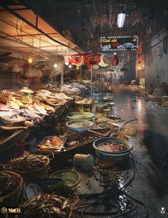 an indoor market with lots of fish and other items on the ground in front of it