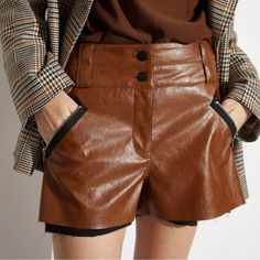 Brand New With Tags Size Xs Classic Leather Moto Shorts In Soft Luxe Cognac Brown Or Black Vegan Leather. Zipper And Black Snap Button Front Closure. Functional Front And Back Pockets With Black Zipper Detailing. The Most Comfortable Pair Of Leather Shorts To Bring You Into Colder Weather. Pair With Your Favorite White Tank And Sneakers For An Effortless Look. True To Size For Women With Shorter Length. Take One Size Up For A More Relaxed Fit To Wear As A Low-Rise Short And Give Extra Length. St Luxury Fitted Brown Bottoms, Luxury Brown Workwear Bottoms, Luxury Brown Bottoms For Workwear, Elegant Brown Leather Bottoms, Luxury Brown Leather Bottoms, Brown Leather Bottoms For Office, Brown Leather Office Bottoms, Formal Leather Brown Bottoms, Formal Brown Leather Bottoms