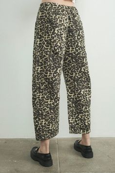 We get you in touch with your wild side with the new Leopard Baggy Jeans. Available in a bold leopard print, these trendy barrel jeans offer wide-leg openings and a baggy fit that is ultra-slouchy and relaxed. features an hourglass shape, seam detailing, Mid-rise waist, belt loops, zip fly, wide leg, and back patch pockets -Mid-rise -Slouchy -Relaxed fit -Wide-legs -Ankle-length Making Pants, Printed Denim Pants, Barrel Jeans, Leopard Jeans, Animal Print Pants, Slouchy Pants, Leopard Pants, Trendy Jeans, Trend Style