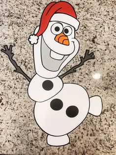 the frozen snowman is wearing a santa hat