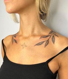 a woman with a tattoo on her chest