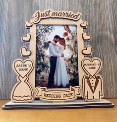 a wooden frame with an image of a bride and groom