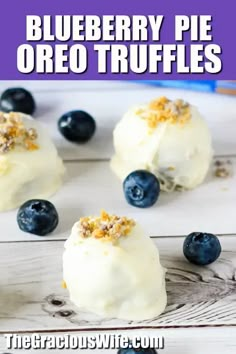 blueberry pie oreo truffles with white frosting and fresh blueberries