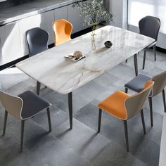 a marble table with chairs around it