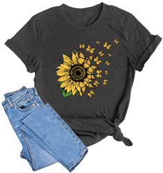 PRICES MAY VARY. 🌻LAZYCHILD SUNFLOWER T-SHIRT: Please recognize our brand and seller LAZYCHILD to ensure quality. lazychild women sunflower shirt is crafted from premium, moisture-wicking fabric for superior comfort and durability. With vibrant, fade-resistant printing and long-lasting color retention, enjoy endless wear with every wash. 🌻FEATURES: LAZYCHILD sunflower t-shirt is an inspirational and cute floral graphic tee for women. Our Sunflower Shirt features a charming, eye-catching sunflo Yellow Short Sleeve T-shirt With Sunflower Design, Cotton T-shirt With Sunflower Design, Yellow Short Sleeve Tops With Sunflower Design, Short Sleeve Yellow Tops With Sunflower Design, Yellow Sunflower Short Sleeve Tops, Casual Sunflower Design Crew Neck T-shirt, Relaxed Fit Short Sleeve T-shirt With Sunflower Design, Toddler Halloween Shirts, Sunflower Graphic