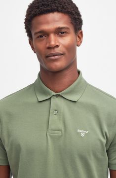 Solid hues means easy versatility in a polo made of breathable cotton piqué that brings sporty, off-court vibes to all your favorite looks. 27 1/2" length (size Medium) Button half-placket Spread collar Short sleeves 100% cotton Machine wash, dry flat Imported Classic Spring Polo Shirt For Golf, Spring Sports Cotton Polo Shirt, Spring Cotton Polo Shirt For Sports, Green Cotton Sporty Polo Shirt, Sporty Cotton Golf Polo Shirt, Green Sporty Cotton Polo Shirt, Sporty Green Cotton Polo Shirt, Classic Polo Shirt With Polo Collar For Sports, Classic Green Polo Shirt With Relaxed Fit