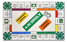 a monopoly board game with four dices and two green shamrocks on the side