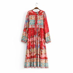 Spring Red Printed Dresses, Red Printed Midi Dress For Spring, Spring Multicolor Cotton Boho Dress, Red Maxi Dress For Beach In Fall, Red Maxi Dress For Fall Beach Occasion, Bohemian Cotton Maxi Dress With Vibrant Print, Red Boho Print Midi Dress For Summer, Red Printed Midi Dress For Fall, Red Long Sleeve Printed Dress