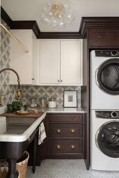 a washer and dryer in a small kitchen