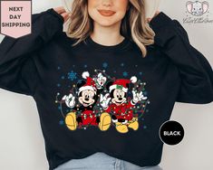 Mickey and Minnie Mouse Christmas Lights Sweatshirt, Mickey's Very Merry Xmas Party Sweatshirt, Disneyland Vacation Gift ORDERING: 1. Review all photos 2. Choose Size and Color from drop-down menu 3. If personalization box is available, add your text color 4. Add each shirt to cart one at a time 5. Click "Add to Cart" - you can go back to add more products 6. Click "Proceed to Checkout" 7. Add note to seller for any requests * We use several different brand shirts, all of them are premium quality and soft shirts. The brands we send may vary depending on our stock situation. * We guarantee 100% satisfaction. The brands we use in- clude premium quality shirt brands such as Bella Canvas, Gildan Soft Style, Circle, Outlash. BULK DISCOUNTS AND SPECIAL REQUESTS: We offer bulk discounts and are o Disney Christmas Sweater, Minnie Mouse Christmas, Disneyland Vacation, Mouse Christmas, Mickey And Minnie Mouse, Brand Shirts, Mickey And Minnie, Xmas Party, Disney Christmas