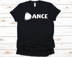 a black t - shirt with the word dance printed on it