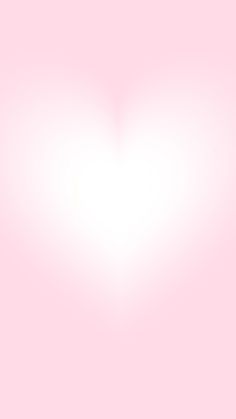 a white heart shaped object on a pink background