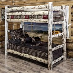 the bunk bed is made out of wood and has two sets of pillows on it