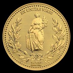 a gold coin with an image of a woman on it