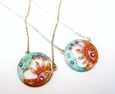 "A necklace in your choice of silver or gold finish with whimsical Boho style featuring a round pendant with half moon & sun cut-outs that are accented with painted touches in lustrous violet-blue and golden-orange! On the cheeks of both the sun and the moon, little Swarovski crystal rhinestones add a bit of colorful glimmer for a touch of glam! And the necklaces offer length options, with the addition of an extender chain...What a fun accent for your outfits! Gold-plated/Silver-plated Neckl Festival Sun And Moon Design Round Necklace, Moon And Stars Necklace, Boho Celestial, Stars Necklace, Sun And Moon Necklace, Sun Moon And Stars, The Sun And The Moon, Sun And The Moon, Large Necklace