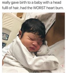 a baby wrapped in a blanket laying on top of a person's arm, with the caption that reads, really gave birth to a baby with a head full of hair