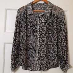 Nwt Free People Black Combo Animal/Floral Print Long Sleeve Bodysuit Blouse, V- Neck, Button Down Front Blouse Sz Xs. Animal Print Shirt Collar With Floral Bodice And Sleeves. Animal Print Barrel Cuff Sleeve Ends That Button. Approximate Measurements: Pit- Pit Across. 25" Pit To Hem. 8.5" Shoulder - Hem. 21" Waist Across. 29" Sleeve Length. 20" N - 40 Black Bohemian Tops For Work, Bohemian Black Tops For Work, Casual Black Paisley Print Blouse, Casual Black Blouse With Paisley Print, Floral Print Tops Blouses, Vintage Floral Blouse, Purple Bodysuit, Animal Print Shirt, Free People Velvet