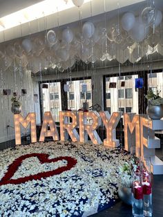 balloons and streamers decorate the entrance to a party