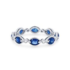 a white gold ring with blue sapphires and diamonds