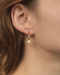 Fantastically stylish - shiny gold earrings with pearls An elegant gold shine, a timeless design and shimmering pearls - that's what makes these earrings special. They are made of gold-plated sterling silver and feature a circle design. Each of the circles is decorated with a shimmering freshwater pearl.     * Buy 2 or more items and get 25% off your order, no code required!  Details  * Ear hooks: 925 sterling silver gold-plated  * Real freshwater pearls  * Pearl size: 7.5-8mm  ‼️As this is a natural product, the color and sizes of the pearls may vary slightly. Hardly any pearl will have a completely perfect surface. Small irregularities and growth features are sure to be found on each pearl.  ✨SHIPPING  * Ready for dispatch in 1-3 working days  * Your order will be lovingly sent in a pack Gold Akoya Pearl Jewelry With Pearl Drop, Yellow Gold Pearl Jewelry With Matching Earrings, Classic Pearl Pendant Earrings In 14k Gold Filled, 14k Yellow Gold Filled Earrings With Pearl Pendant, Yellow Gold Earrings With Pearl Pendant, Yellow Gold Pearl Pendant Earrings 14k Gold Filled, 14k Yellow Gold Pearl Pendant Earrings, Graceful Yellow Gold Jewelry With Pearl Drop, Graceful Yellow Gold Pearl Drop Jewelry