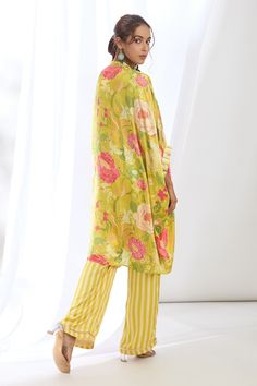 Yellow printed high-low kaftan featuring chrysanthemum patterns, embellished by lace and tassels on bodice. Comes with stripe print pant. - Aza Fashions Gopi Vaid, Print Pant, Pant For Women, Yellow Satin, Cape Sleeves, Satin Color, Yellow Print, Pants Pattern, Printed Pants