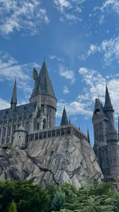 hogwarts castle on top of a rock formation