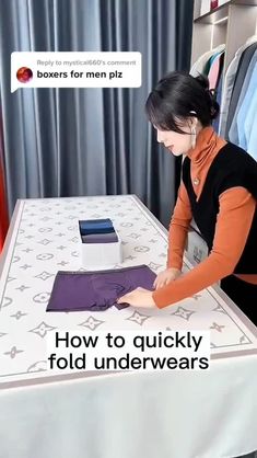 a woman standing at a table with an object on it's surface and the text, how to quickly fold underwears