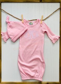 Personalized Baby Gown/Baby Girl Coming Home Outfit/Baby Girl Outfit/Monogrammed Baby Coming Home Outfit/Monogrammed Gown/PersonalizedGown This gown features personalization of your choice as a baby shower gift or for your new, sweet addition. The design on the items included in this set is embroidered meaning it is stitched onto the shirt for great durability and quality.  PROCESSING TIME IS CURRENTLY TWO WEEKS FROM DATE OF PURCHASE. Processing time does not include shipping, which is an additional 3-5 business days.  If needed sooner, please message me.  This baby gown is a boutique quality baby gown, they are thick and very soft. The gowns are one size, but fit like 0-3m. Colors can be customized, please just send me a message!  Washing instructions:  -Machine wash cold, and hang to dry Spring Cotton Long Sleeve Gown, Spring Long Sleeve Cotton Gown, Cotton Long Sleeve Spring Gown, Personalized Fitted Cotton Dress, Fitted Long Sleeve Cotton Gown, Monogram Onesies, Personalized Onesie Girl, Embroidered Onesie Girl, Personalized Fitted Pink Onesie