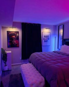 a bedroom with purple lighting and a bed in the corner, along with pictures on the wall