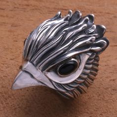 Watching with sharp eyes of natural dark obsidian the face of a hawk crowns this bold men's ring from Bali. Henry Anthony Sanny designs this masculine accessory. Sharp Eyes, Obsidian Ring, Mens Silver Jewelry, Eagle Ring, Sterling Silver Rings Bands, Men Ring, Sterling Silver Mens, Silver Band Ring, Men's Ring