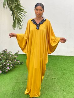 Beautiful mustard yellow Kaftan. Perfect for a special occasion or casually worn on warm evenings.