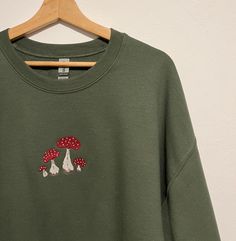 Mushroom Embroidered Sweatshirt 🍄 Customisable Mush Sweater - message for custom thread colours! - Super soft sweatshirt blend 50% Cotton, 50% Polyester - Sizes S - 2XL+ 👇 Please read before ordering 👇 Processing time: UK dispatch between 5-7 Days, up to 2 weeks during busier periods. International Shipping available All Embroidered Clothing, Totes & Accessories stitched here in our London studio If the item you want is sold out, send us a message & we'll make you another! Don't hesitate to c Relaxed Fit Fall Tops With Mushroom Print, Relaxed Fit Top With Mushroom Print For Fall, Relaxed Fit Mushroom Print Top For Fall, Cotton Fall Sweatshirt With Mushroom Print, Cotton Sweatshirt With Mushroom Print, Cotton Sweatshirt With Mushroom Print For Fall, Winter Cotton Tops With Mushroom Print, Cotton Crew Neck Sweatshirt With Mushroom Print, Cotton Long Sleeve Sweatshirt With Mushroom Print