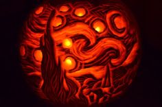 a carved pumpkin with candles in it