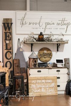 a room filled with lots of different types of furniture and signs hanging on the wall